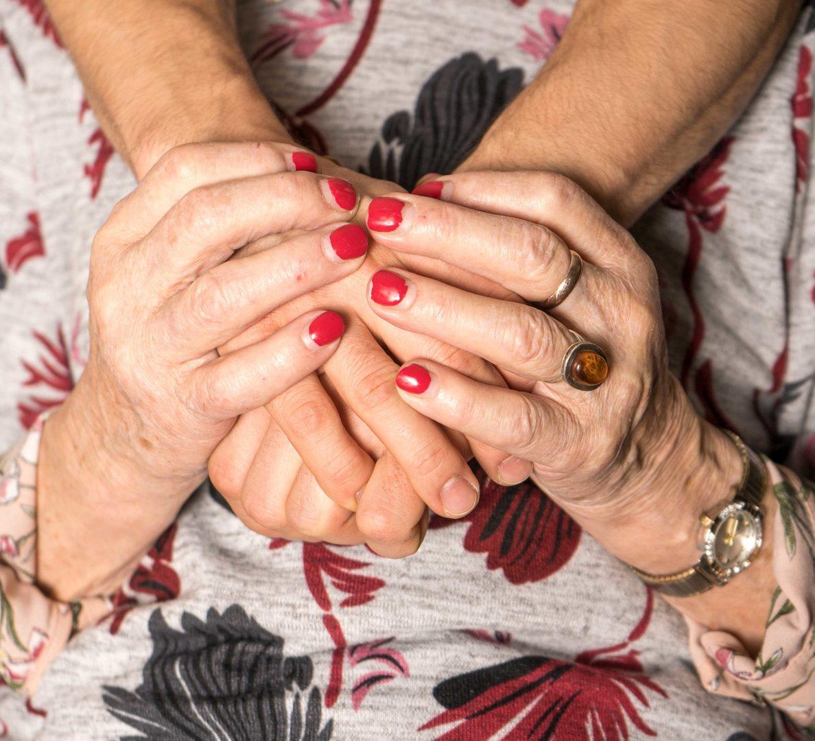 A photo of hands holding hands
