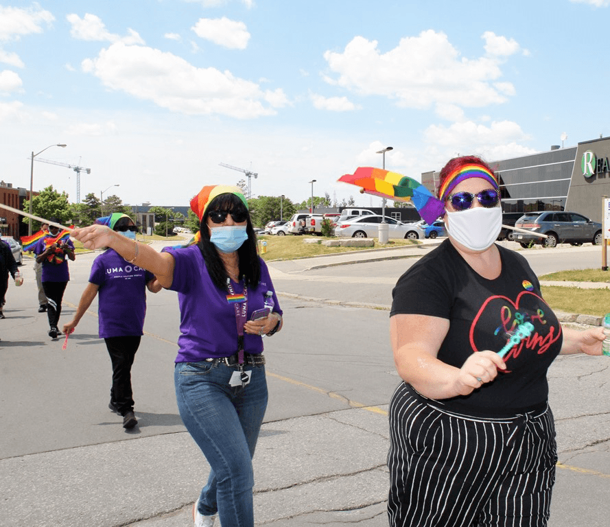 Lumacare staff members celebrating in the Toronto Pride festivities